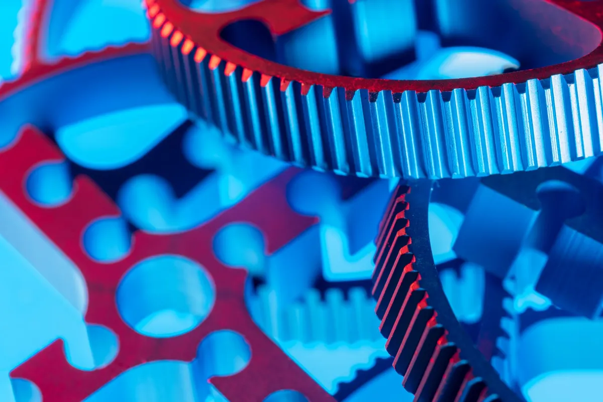 Interlocking gears and parts, like steps in an automated flow