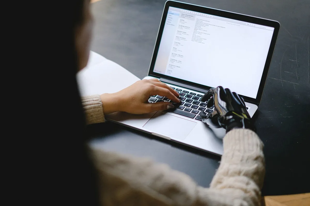 Person typing on a laptop