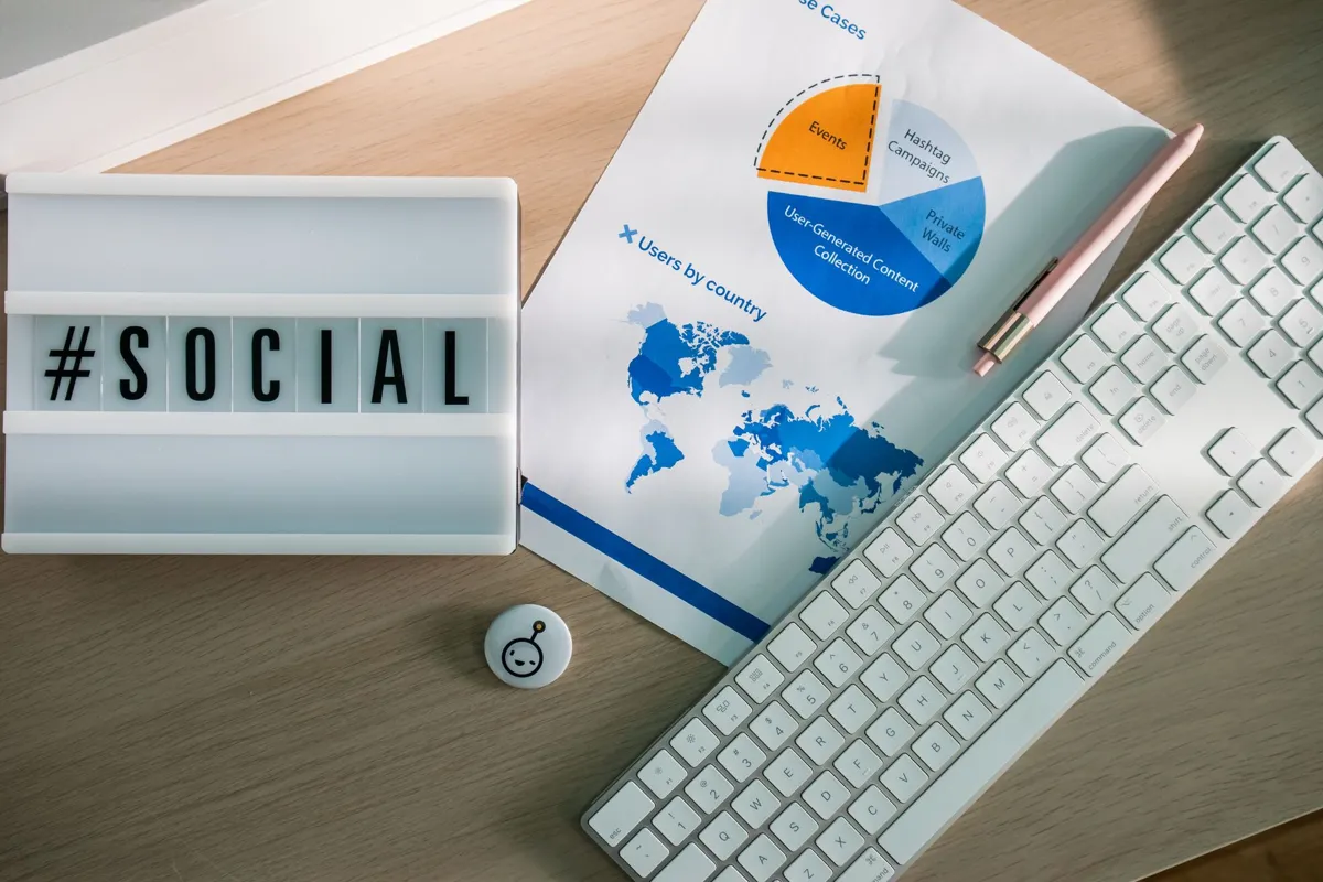 Social media letter board and analytics chart on a desk