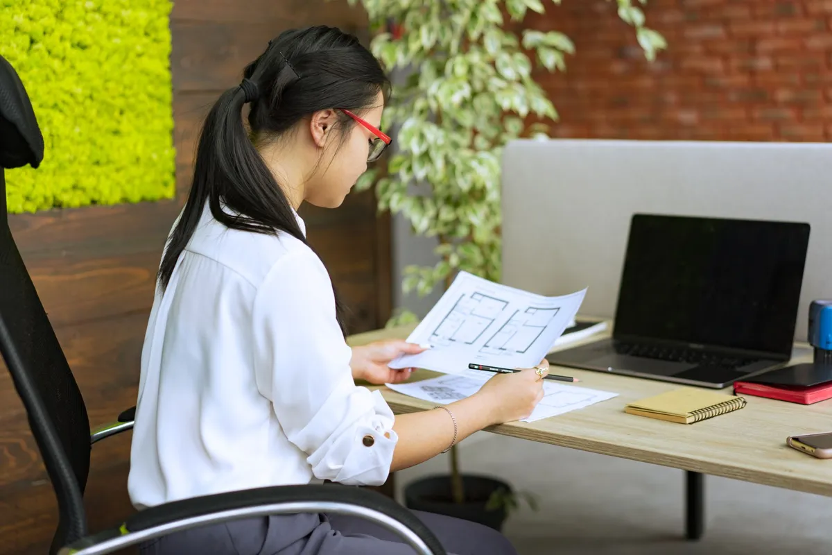 Learner checking course options on a laptop